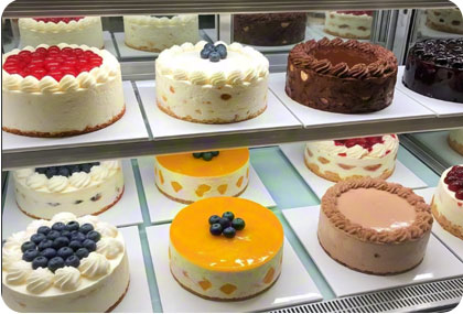 The cakes in the display cabinet